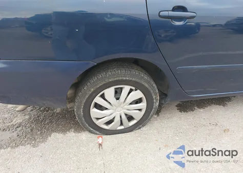 2005 Toyota Corolla Le z USA, uszkodzony, nr VIN 2T1BR30E15C558397